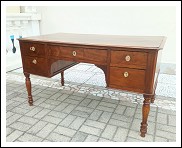 Antico scrittoio a cassetti. 139lx80x78