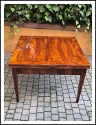 Tavolo antico allungabile a tiro lastronato noce e filetato