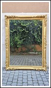 Specchiera antica emiliana traforata in legno dorato, di met&agrave; &rsquo;800.